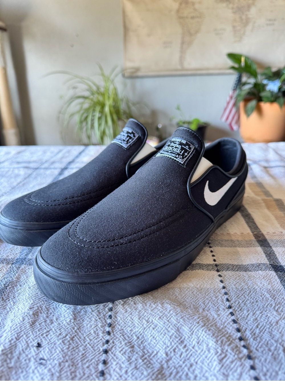 Nike Slip-On Canvas Loafers in Black with White Swoosh